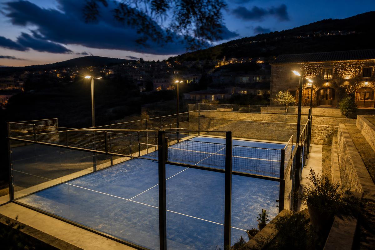 Padel court lit for an evening game